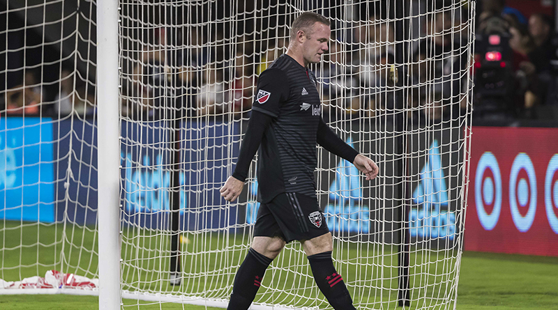 D.C. United forward Wayne Rooney (9) leaves the pitch after receiving a red card against the New York Red Bulls during the first half at Audi Field.
