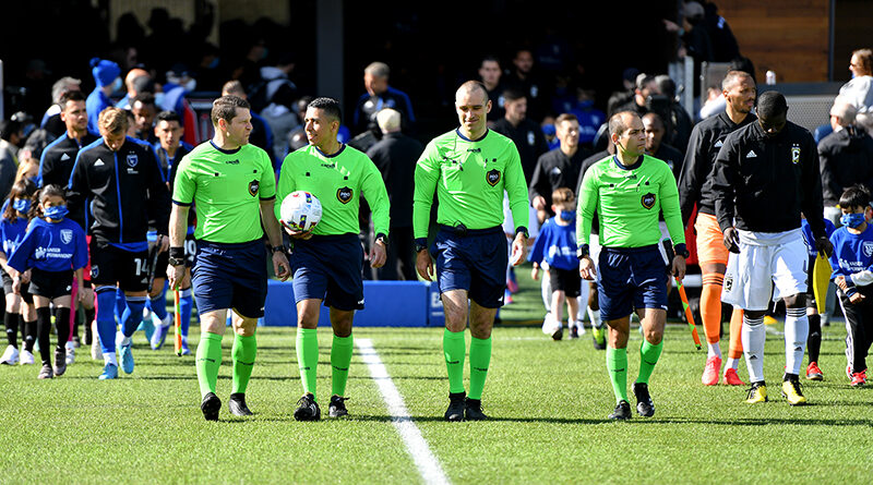 Referee Guido Gonzales Jr. leads the San Jose Earthquakes and the Columbus Crew onto the field with fellow officials Jeremy Hanson, Diego Blas, and Elijio Arreguin before a game between Columbus Crew and San Jose Earthquakes at PayPal Park on March 5, 2022 in San Jose, California. Lyndsay Radnedge/isiphotos.com