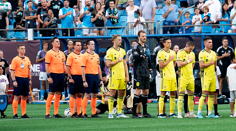 MLS crew during national anthems